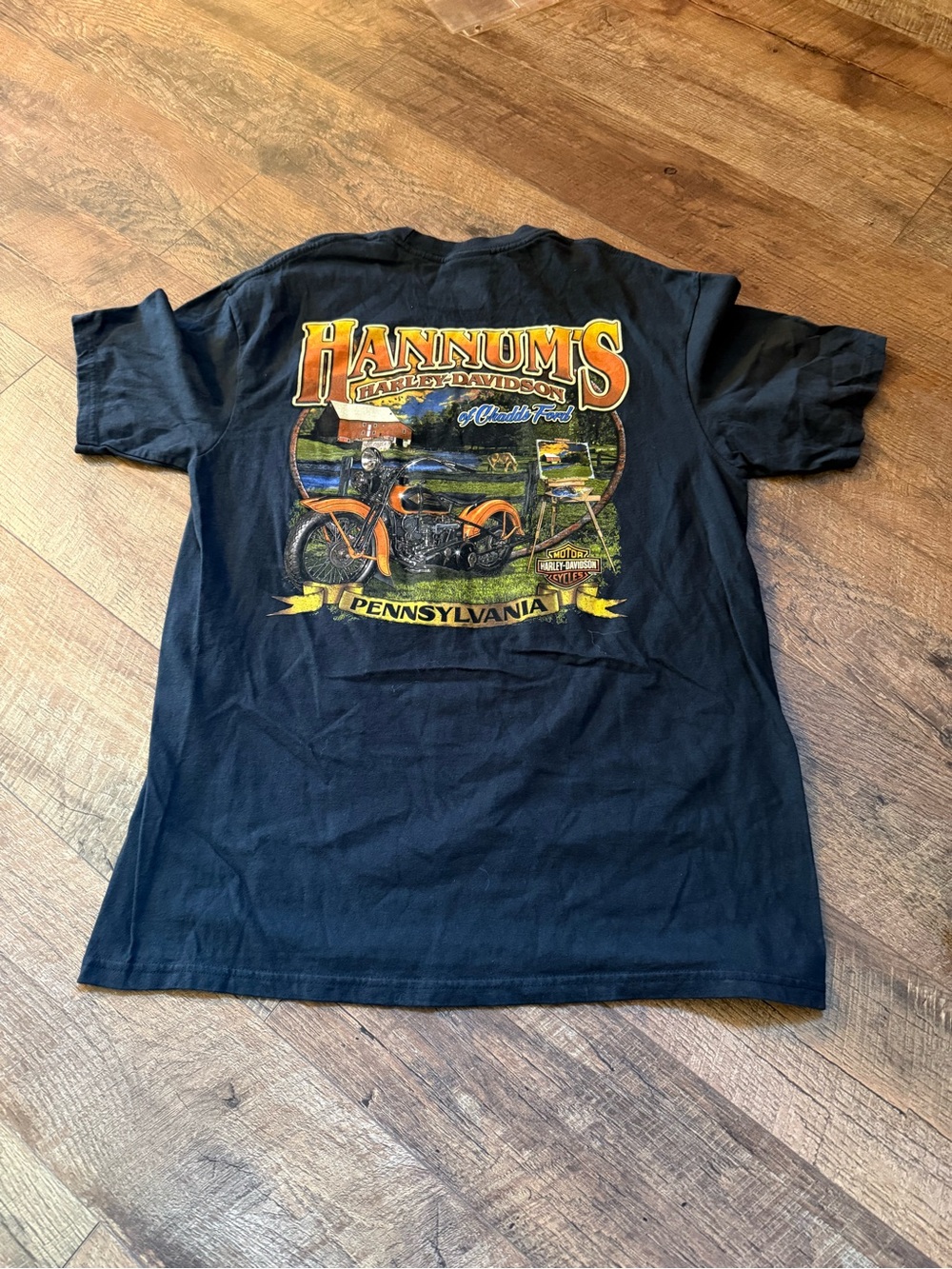 Harley-Davidson Black T‑Shirt with Orange and Yellow Motorcycle Graphic